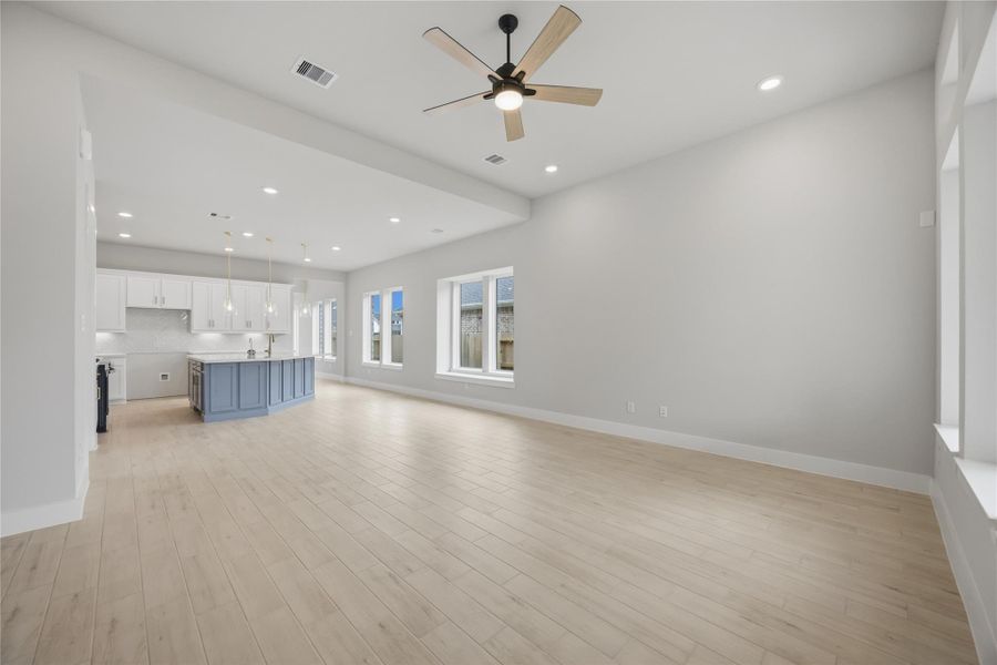 Spacious, unfurnished interior of a new home in Ellwood, Iowa Colony (Image 23).