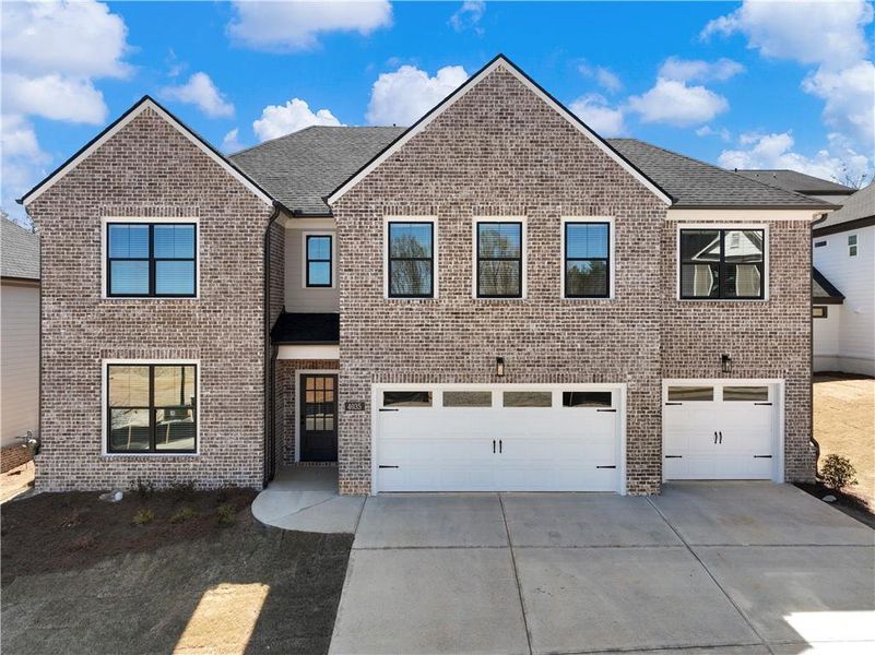 Front exterior of a new home in , Lawrenceville, GA, highlighting curb appeal (Image 1). Front exterior of a new home in , Lawrenceville, GA, highlighting curb appeal (Image 1).