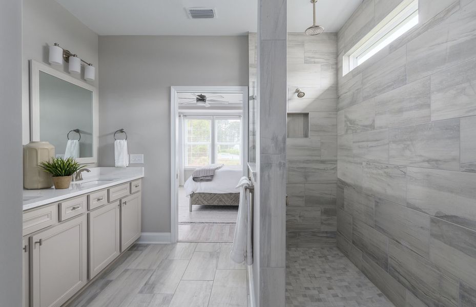 Owner's Bath with a modern  walk-in shower.