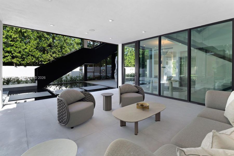 Exterior details and patio area of a home in , Miami Beach (Image 25). Exterior details and patio area of a home in , Miami Beach (Image 25).