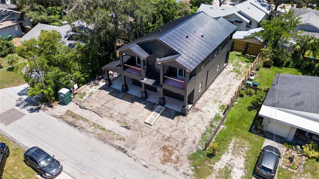 Front exterior of a new home in , Tampa, FL, highlighting curb appeal (Image 23).