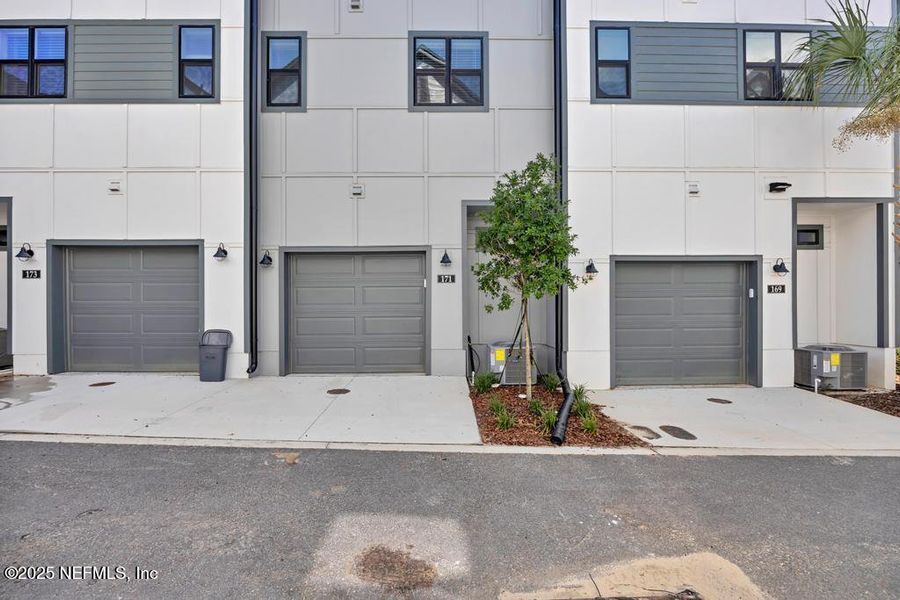 Front exterior of a new home in Johnson Commons, Jacksonville, FL, highlighting curb appeal (Image 18). Front exterior of a new home in Johnson Commons, Jacksonville, FL, highlighting curb appeal (Image 18).