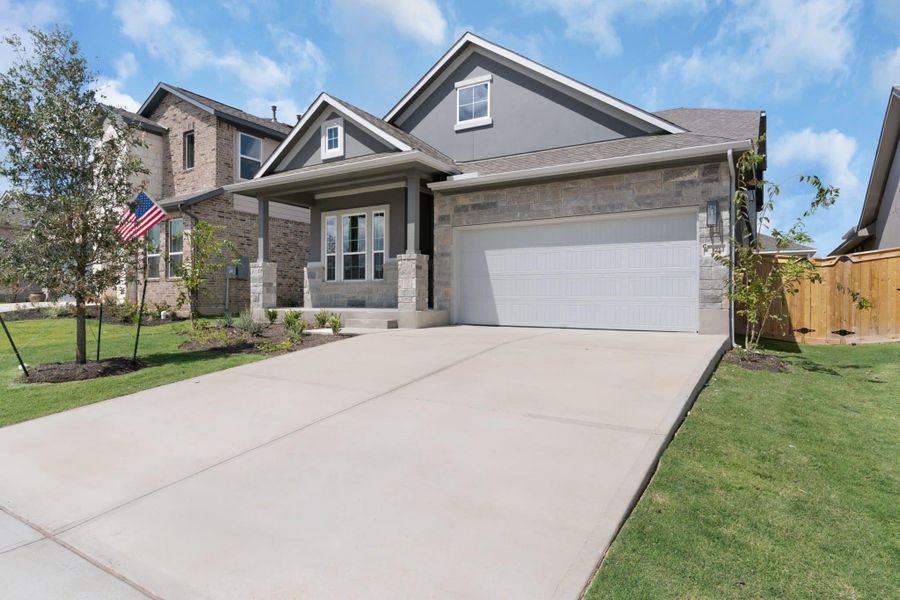 Front exterior of a new home in Nolina, Georgetown, TX, highlighting curb appeal (Image 22).