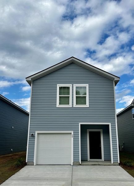 Front exterior of a new home in Pinckney Place, North Charleston, SC, highlighting curb appeal (Image 14).