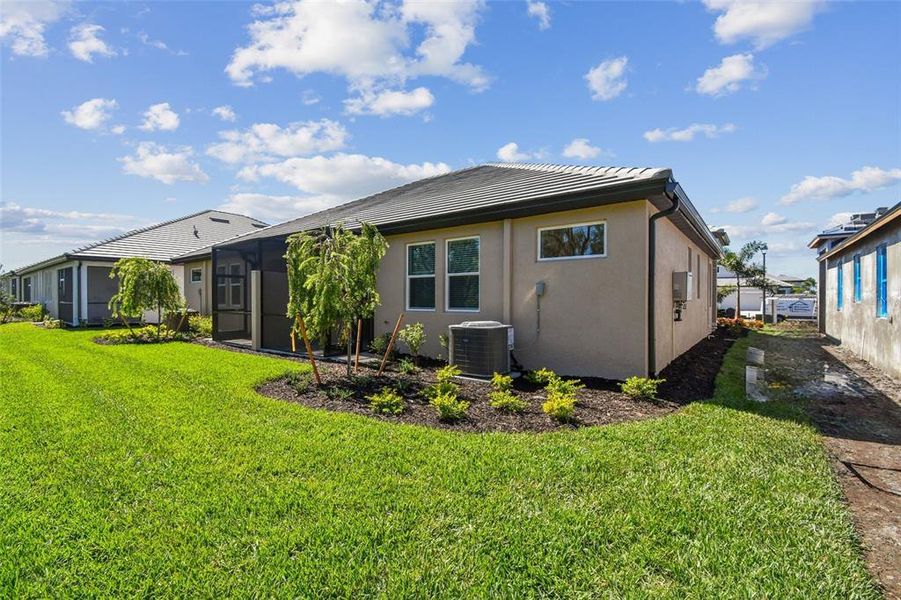 Exterior details and patio area of a home in Sweetwater at Lakewood Ranch, Lakewood Ranch (Image 2).