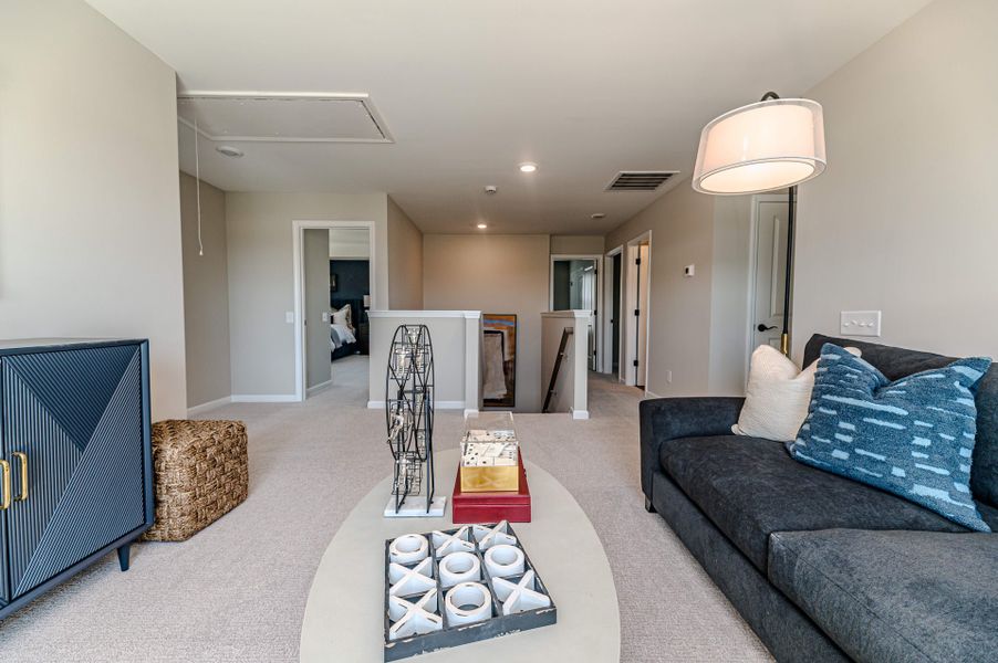 Representative furnished interior of a home built from the Watauga by McKee Homes in Terrapin, Leland (Image 10).