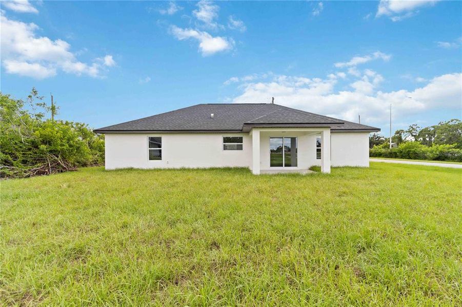 Front exterior of a new home in , Rotonda West, FL, highlighting curb appeal (Image 21).
