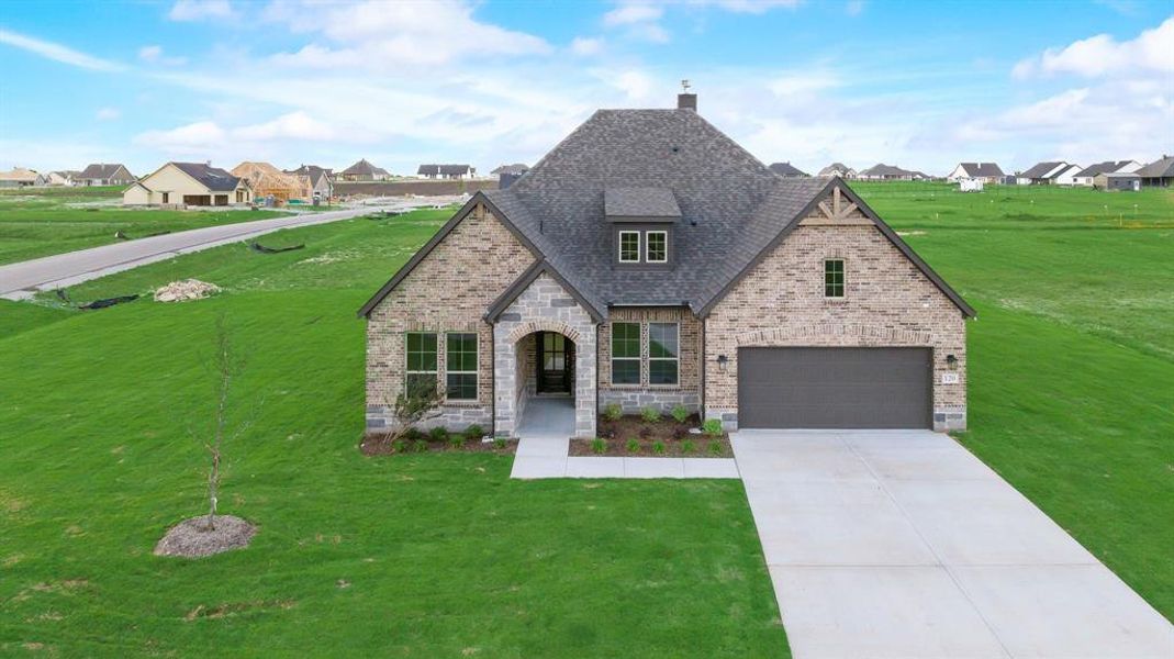 Front exterior of a new home in Fairview Meadows, New Fairview, TX, highlighting curb appeal (Image 1). Front exterior of a new home in Fairview Meadows, New Fairview, TX, highlighting curb appeal (Image 1).