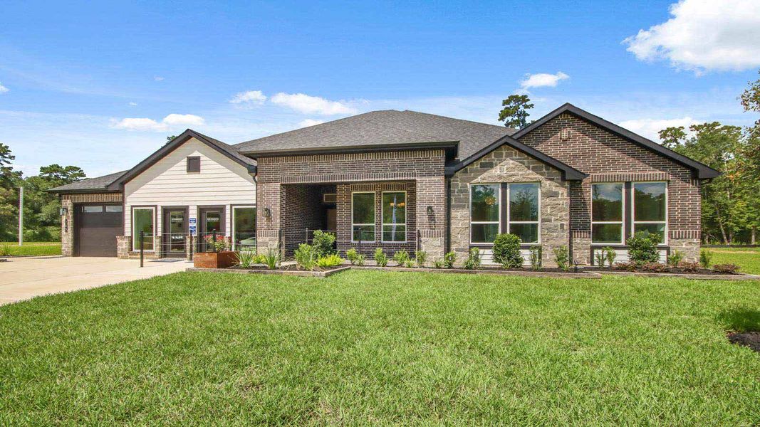 Front exterior of a new home in Butlers Bend Estates, Pinehurst, TX, highlighting curb appeal (Image 26).