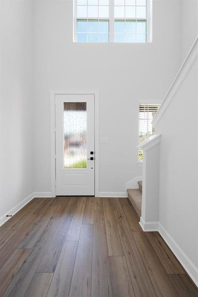 The design of your upgraded front door is one of the many features you will love about this house each time you come home.