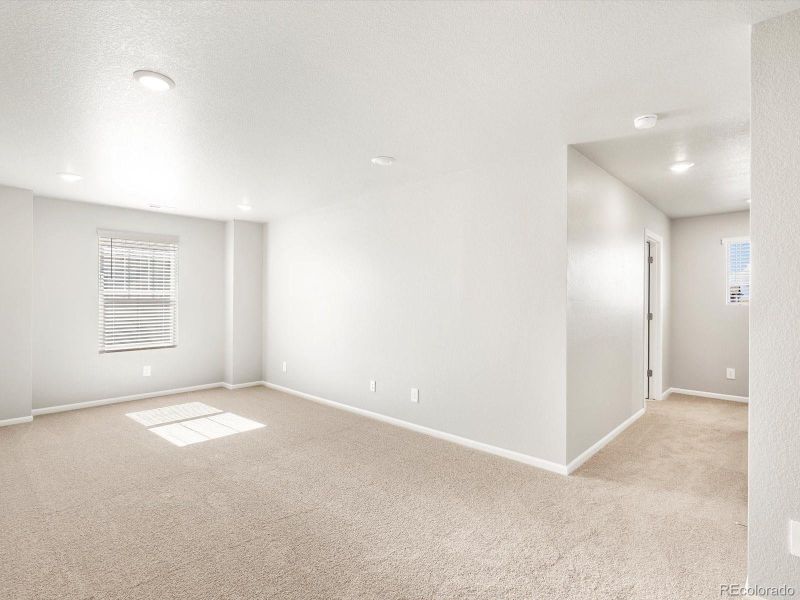 Spacious, unfurnished interior of a new home in Buffalo Highlands: The Flora Collection, Commerce City (Image 24).