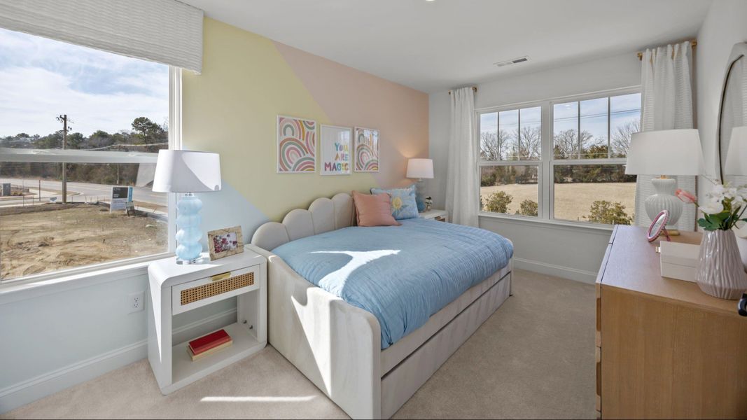 The Rochester Plan by DRB homes spacious secondary bedroom in Charlotte, NC.