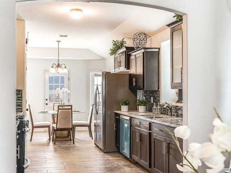 Representative furnished interior of a home built from the Valerie 1371 SSC by Saratoga Homes in Crossland, El Paso (Image 3).