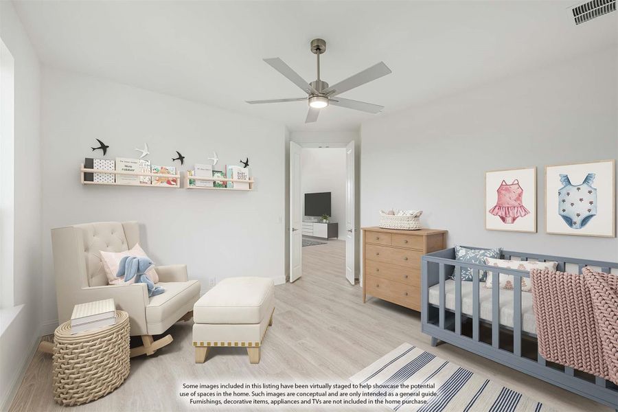 Nursery with gray crib, wood dresser, rocking chair, ceiling fan, and light hardwood floors Nursery with gray crib, wood dresser, rocking chair, ceiling fan, and light hardwood floors