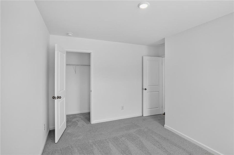 Spacious, unfurnished interior of a new home in Towns at Ivy Creek, Buford (Image 12).