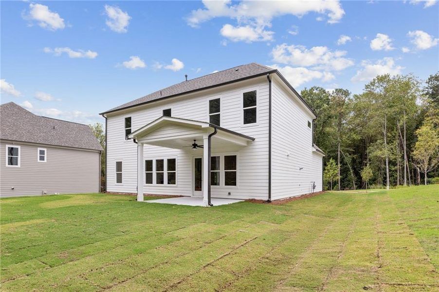 Exterior details and patio area of a home in Ashbury Commons, Powder Springs (Image 3).