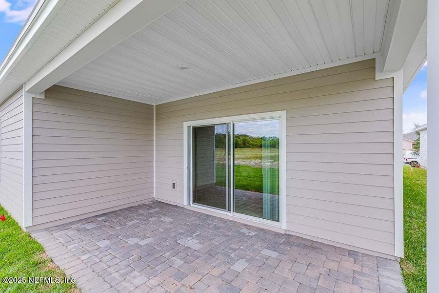 Front exterior of a new home in Coopers Meadow, Jacksonville, FL, highlighting curb appeal (Image 21).