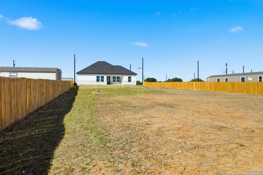 Exterior details and patio area of a home in , Atascosa (Image 4).