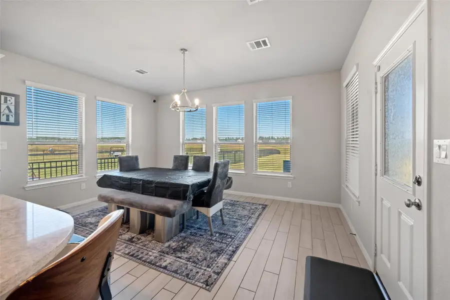 Furnished interior view inside a new home in Waterstone on Lake Conroe, Montgomery (Image 11).