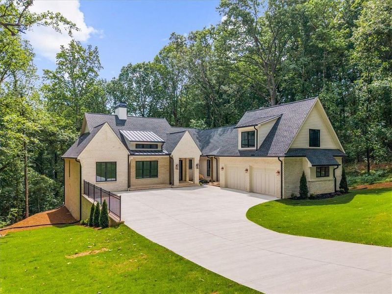 Front exterior of a new home in , Cumming, GA, highlighting curb appeal (Image 27).