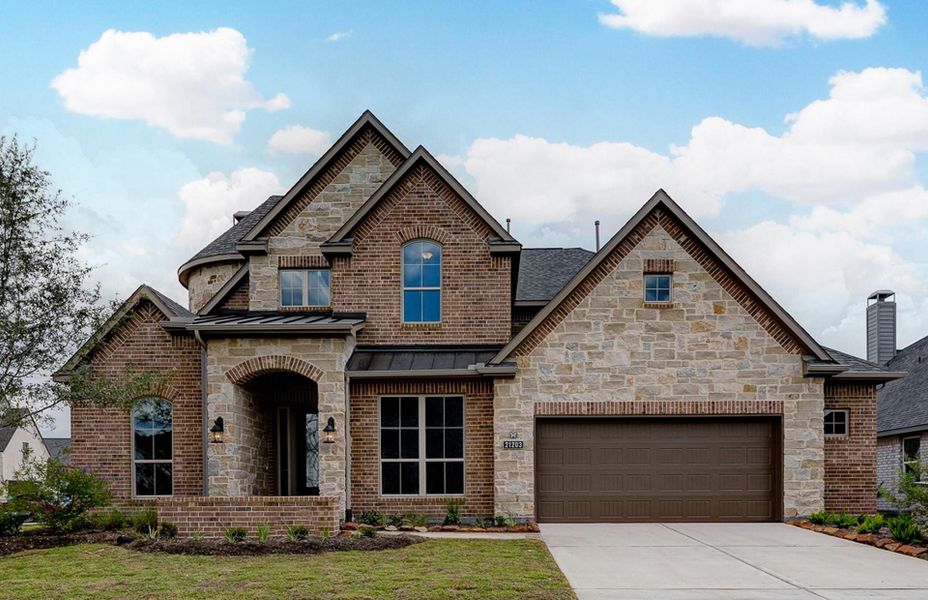 Front exterior of a new home in Bridgeland 60′, Cypress, TX, highlighting curb appeal (Image 1).