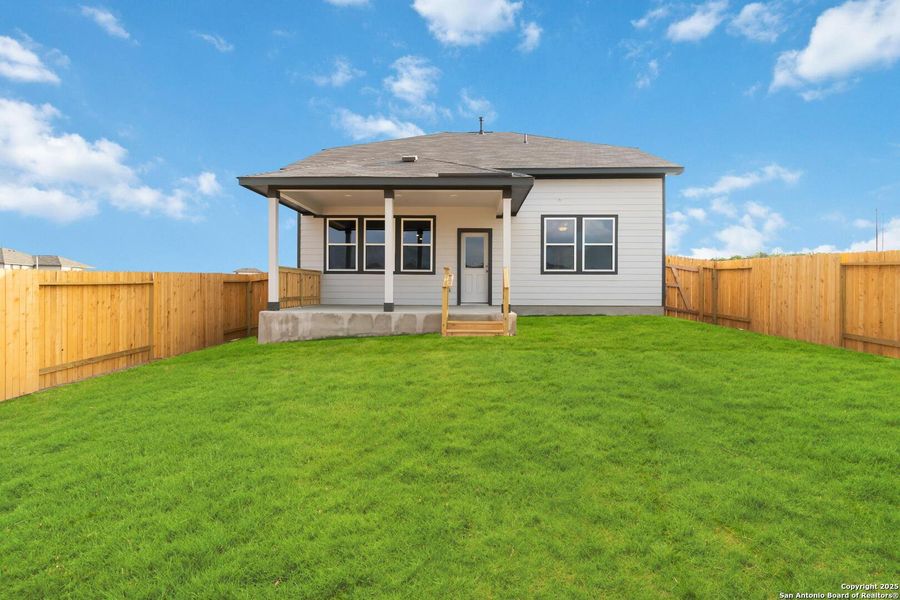 Front exterior of a new home in Hunters Ranch, San Antonio, TX, highlighting curb appeal (Image 2). Front exterior of a new home in Hunters Ranch, San Antonio, TX, highlighting curb appeal (Image 2).