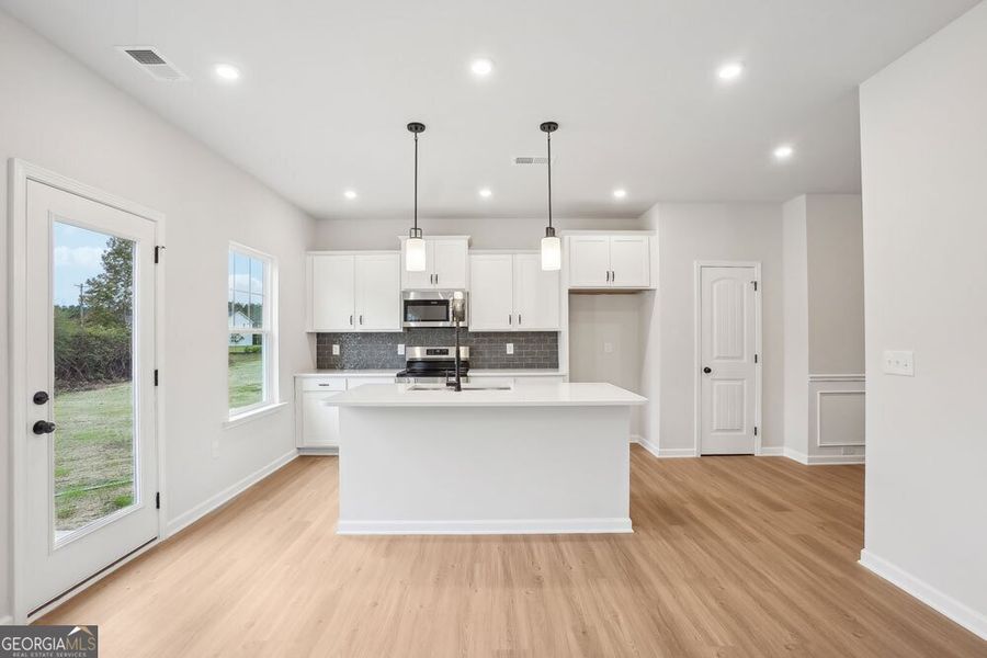 Furnished interior view inside a new home in Stonebridge North, Macon (Image 3).