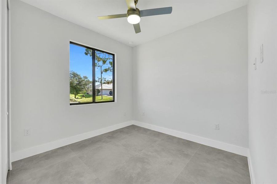 Spacious, unfurnished interior of a new home in , Lehigh Acres (Image 8).