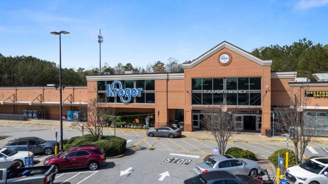 Front exterior of a new home in Fairhaven, Lithia Springs, GA, highlighting curb appeal (Image 25). Front exterior of a new home in Fairhaven, Lithia Springs, GA, highlighting curb appeal (Image 25).