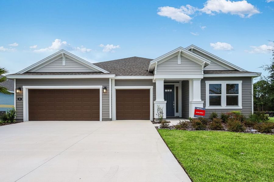 Representative exterior photo of a completed home built from the Magdalen by Taylor Morrison in Colbert Landings, Palm Coast, FL (Image 1).