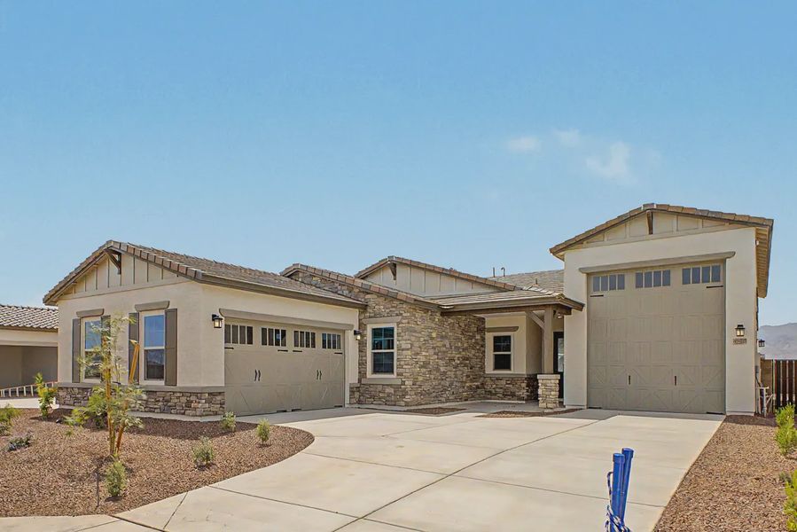 Front exterior of a new home in Valencia at Granite Vista, Waddell, AZ, highlighting curb appeal (Image 19).