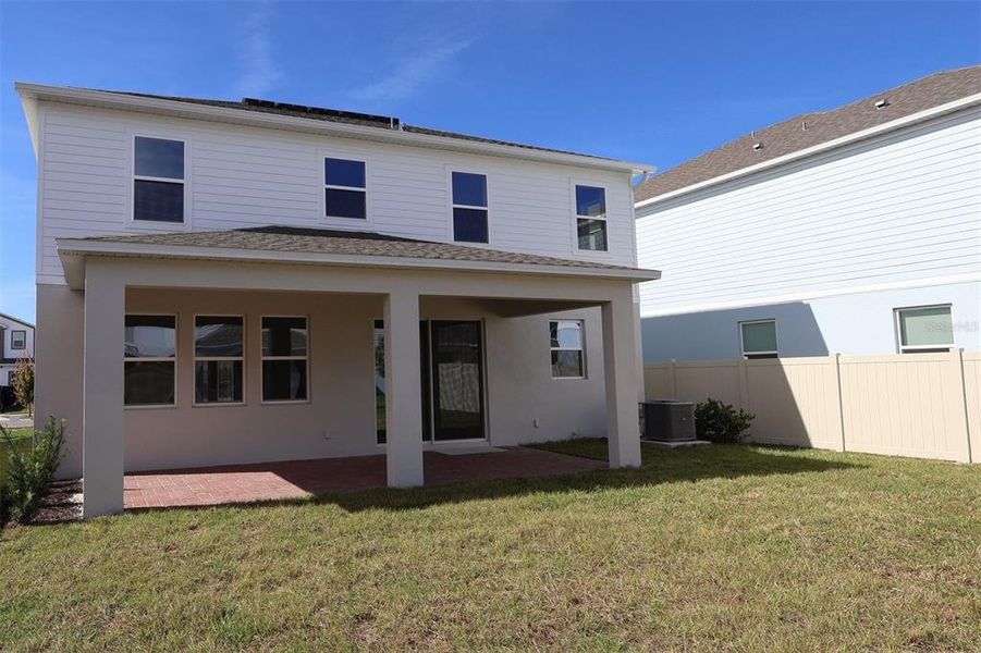 Exterior details and patio area of a home in Eden at Crossprairie, St. Cloud (Image 18).
