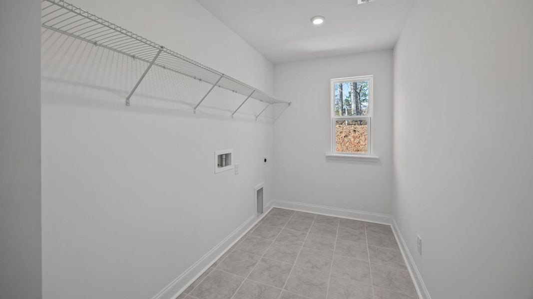 The Burton Plan in Farms at Bellingham by DRB Homes in Charlotte NC - Laundry