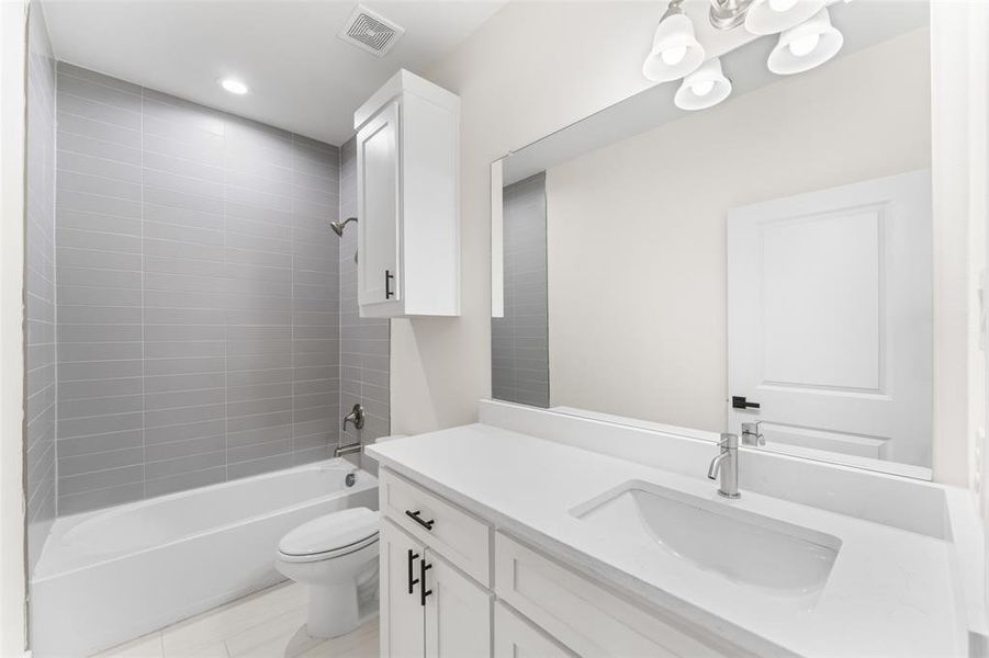 Full bath featuring washtub / shower combination, and spacious vanity. Full bath featuring washtub / shower combination, and spacious vanity.