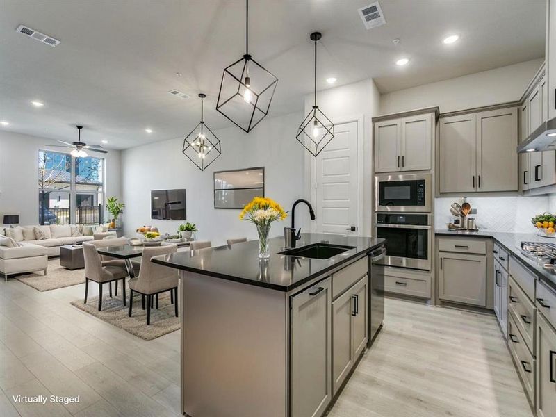Furnished interior view inside a new home in Hillside at Las Colinas, Irving (Image 5). Furnished interior view inside a new home in Hillside at Las Colinas, Irving (Image 5).