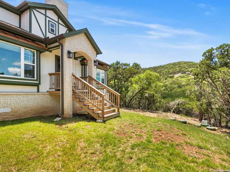 Exterior details and patio area of a home in , Bandera (Image 24).