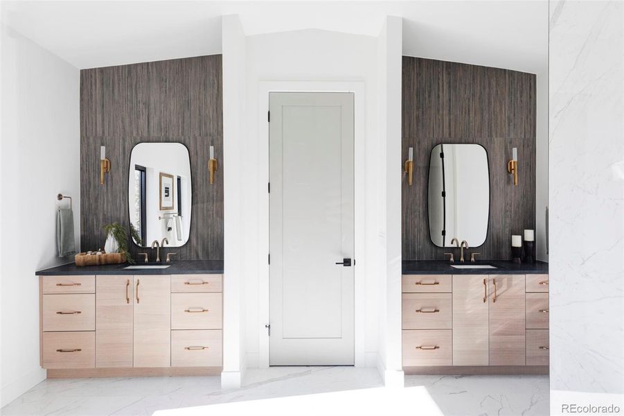 Primary bath features 2 separate vanities