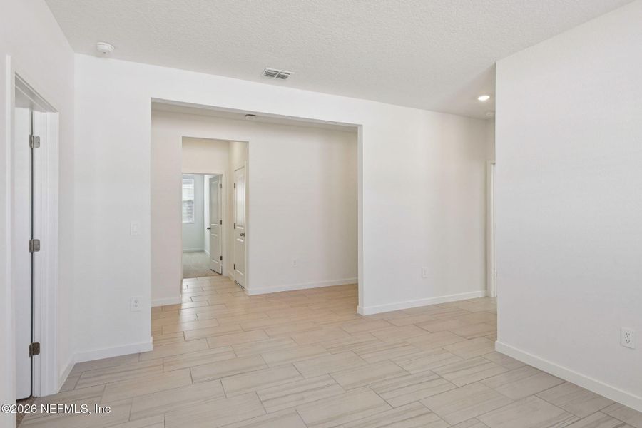 Spacious, unfurnished interior of a new home in Lakes at Bella Lago - Signature Series, Green Cove Springs (Image 39).