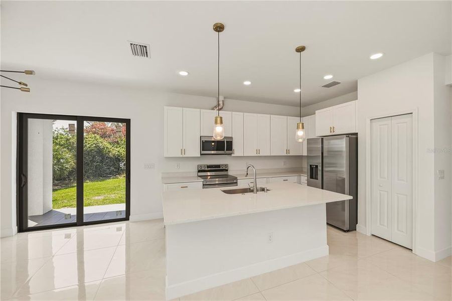 Furnished interior view inside a new home in , Port Charlotte (Image 35).
