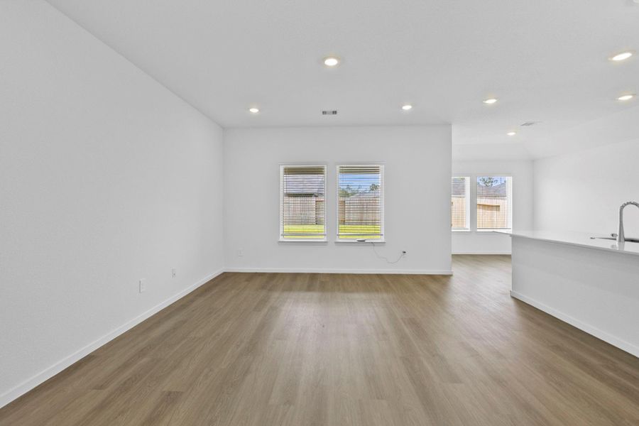 Spacious, unfurnished interior of a new home in The Canopies, Splendora (Image 14).