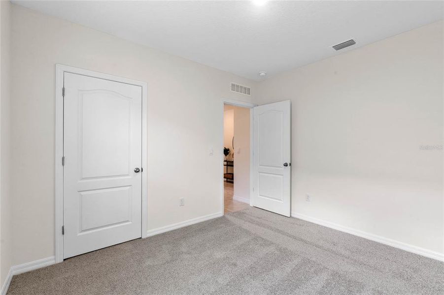 Spacious, unfurnished interior of a new home in Harmony at Lake Eloise, Winter Haven (Image 34).