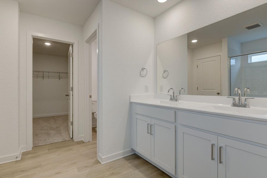Representative furnished interior of a home built from the Alexis by Ashton Woods in Nopal Valley, San Antonio (Image 10).