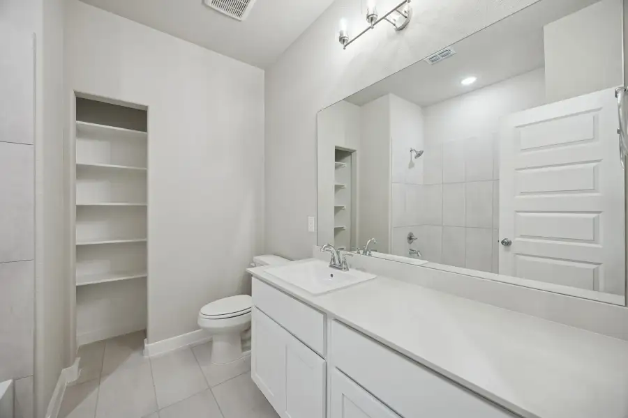 Bathroom in the Stanley II home plan by Trophy Signature Homes – REPRESENTATIVE PHOTO Bathroom in the Stanley II home plan by Trophy Signature Homes – REPRESENTATIVE PHOTO
