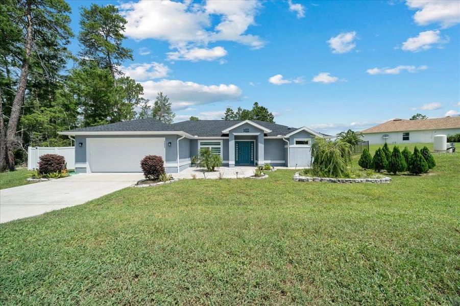 Front exterior of a new home in , Ocala, FL, highlighting curb appeal (Image 38). Front exterior of a new home in , Ocala, FL, highlighting curb appeal (Image 38).
