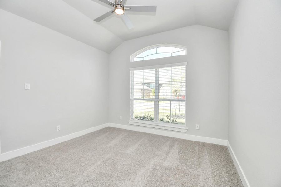 Secondary bedroom features plush carpeting, large windows that let in plenty of natural light, bright paint, and spacious closets. Secondary bedroom features plush carpeting, large windows that let in plenty of natural light, bright paint, and spacious closets.
