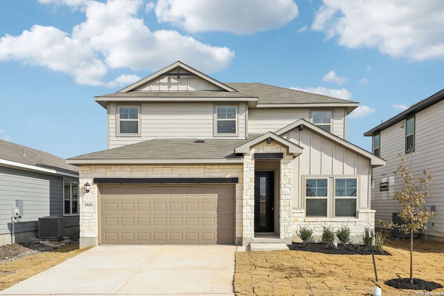 Front exterior of a new home in Catalina, Converse, TX, highlighting curb appeal (Image 23).