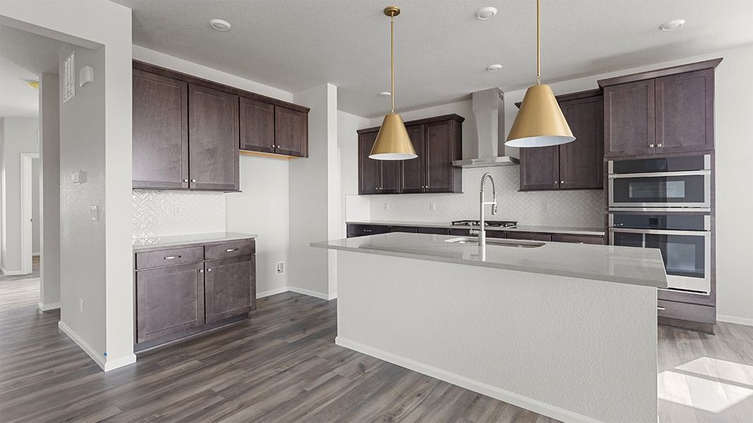 Furnished interior view inside a new home in The Legacy Collection at Talon Pointe, Thornton (Image 5).