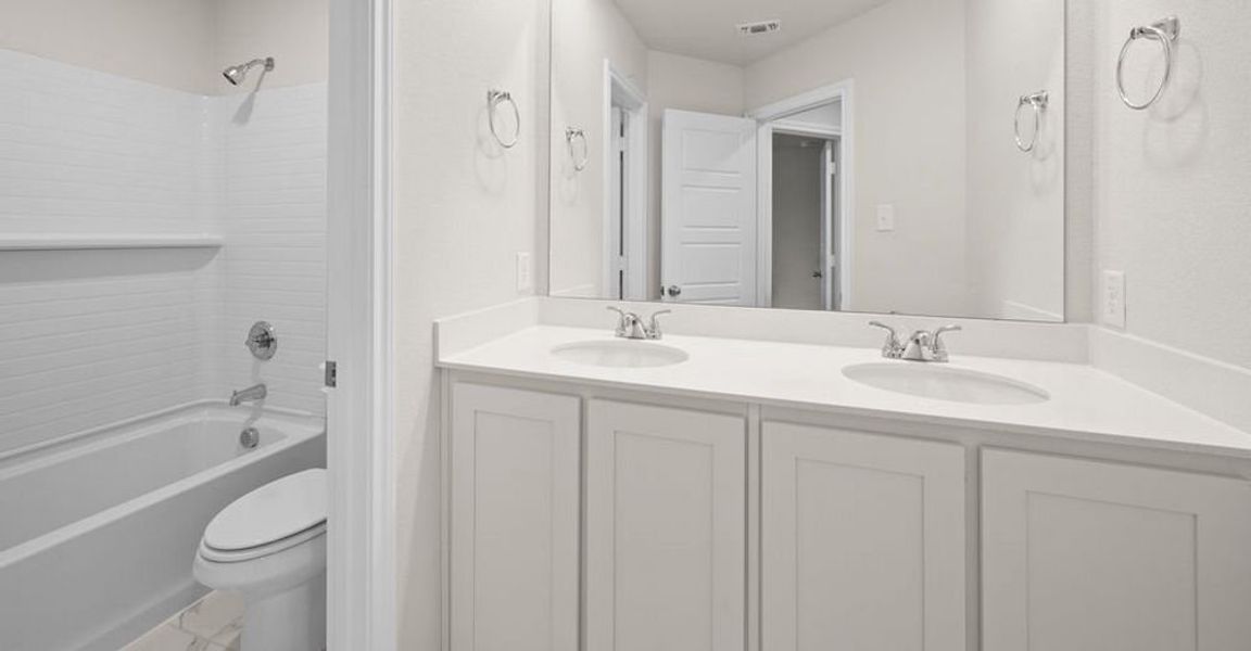 Representative exterior photo of a completed home built from the Salinas by Impression Homes in Redden Farms, Midlothian, TX (Image 20). Representative exterior photo of a completed home built from the Salinas by Impression Homes in Redden Farms, Midlothian, TX (Image 20).