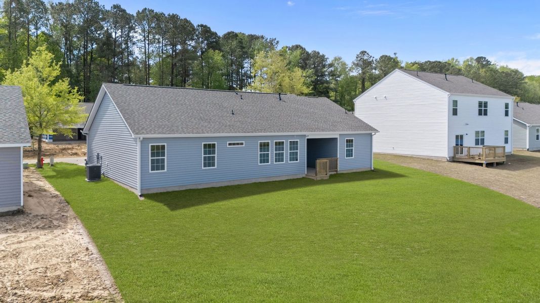 Exterior details and patio area of a home in Tyler - Home on the Lake, New Bern (Image 4).