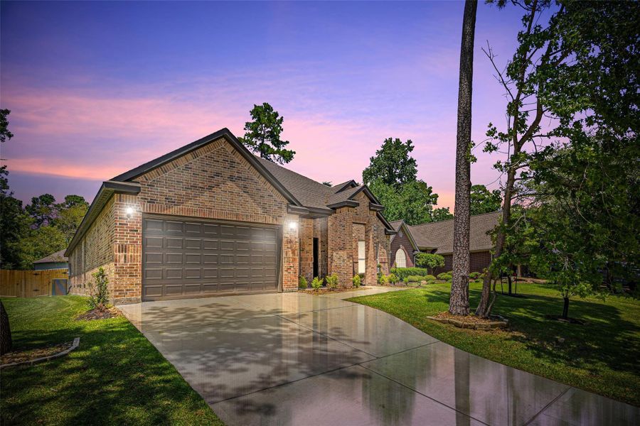 Front exterior of a new home in , Montgomery, TX, highlighting curb appeal (Image 14).